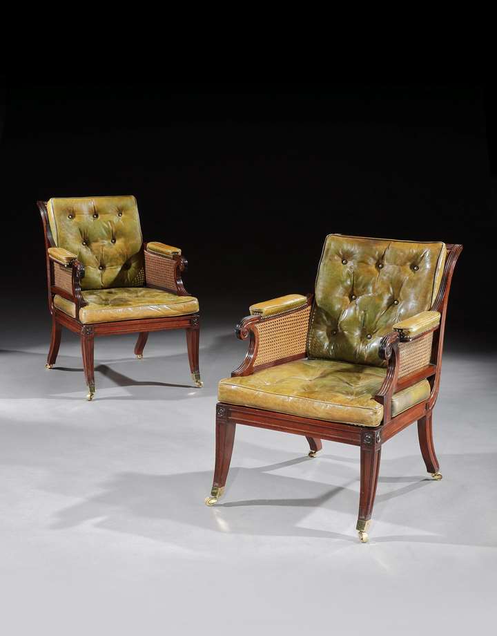 A PAIR OF REGENCY MAHOGANY BERGERE CHAIRS